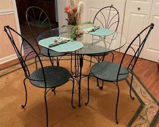 wrought iron glass top table & chairs