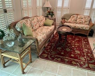 Santa Monica wicker furniture - glass top table, sofa & loveseat; 5'x8' Turkish area rug; bamboo tea table