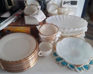 Fire King swirl pattern  9 inch plates, berry bowls and serving pieces 