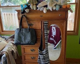Tall dresser with oval mirror that matches the nightstands and the low dresser
