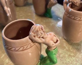Six nude woman mugs
