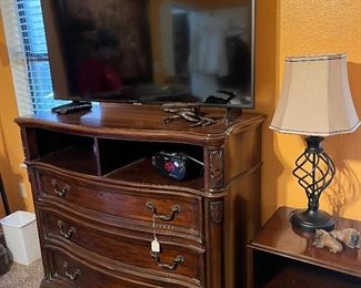 chest of drawers and flat screen tv