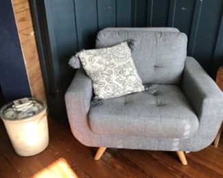 Grey arm chair, 10 gallon crock with glass top