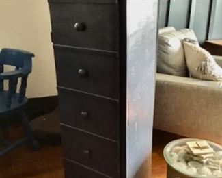 Five drawer tall chest,  no it’s not drawers.   It’s a single door. opens like a cabinet.  