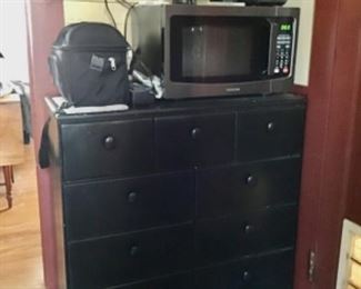 Black chest of drawers, microwave