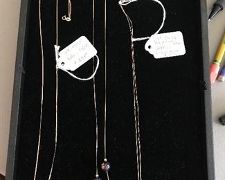 14 carat gold jewelry. Pair of gold and peridot studs 