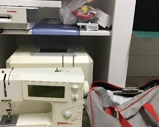 Bernini sewing machine with large group of attachments 