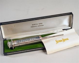 Everyone needs a sterling vermouth dispenser  from Neiman Marcus or as I call them Needless Markup