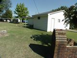 Large workshop in back yard included in the sale of the house