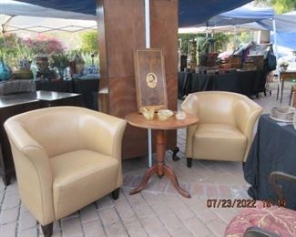 Pair of leather chairs w antique table