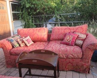 one of two over stuffed couches