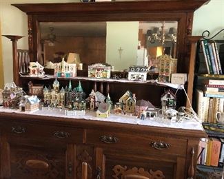 Antique buffet with d-56 villages ; many more village unpacked; Minton tiffin-Franciscan crystal 