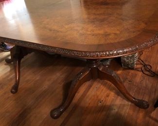 The table is 6’ in length with a 28” leaf that has the same carved border