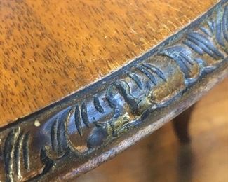 Edge of regency carved edge table