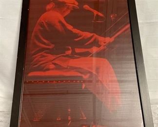 INV #117: Framed poster of Elton John with red lighting, H 24" x W 17.5"