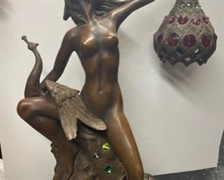 INV #225:                                                                                           Bronze Art Nouveau Peacock Lady Lamp                   Marked Philippe Wolfers                                                               19 inches tall