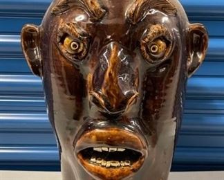 INV #235:                                                                                            Marked Charlie Brown Face Jug 2006