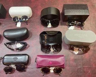 Collection of designer sunglasses: Prada, Fendi, Versace, Ralph Lauren, Ray Ban, Persol, Peter Max and more...
