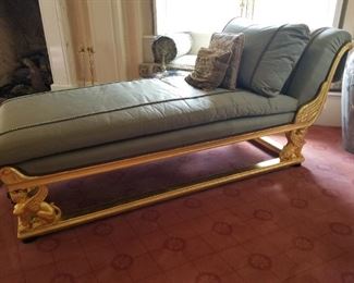 French Empire giltwood chaise lounge upholstered in silk satin.