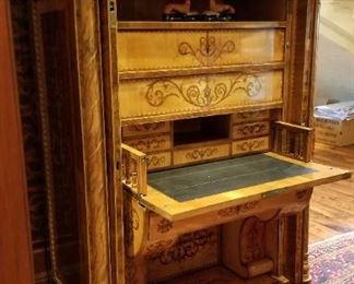 Extremely fine and unusual inlaid Biedermeier pull out / fall front secretary w/retractable doors and multiple hidden compartments. German c.1840-60