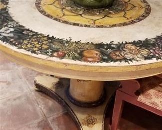 Neoclassical floral painted/nicely distressed pedestal table.