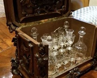 Interior detail of hand blown / etched decanters and glasses.