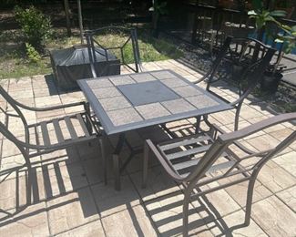 Table with 4 chairs (chairs have cushions/not shown) $200 for set including cushions (like new)