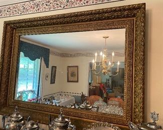 large gold framed mirror