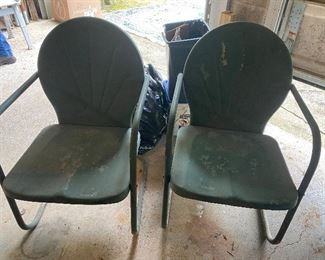 Pair of vintage metal cantilever outdoor chairs