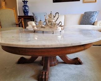 Large claw foot table with marble top