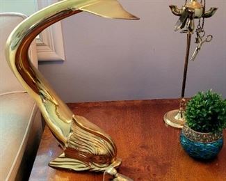 Large brass stylized dolphin