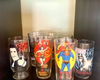 Collectible glassware including Batman, Star Wars, wonder woman, and Fonz
