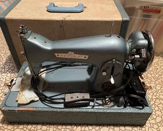 Vintage sewing machine and case