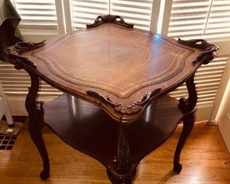 Leather top end table with carved details (21” square, 26”H)