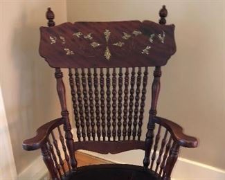 Antique rocker with mother of pearl inlay on back 