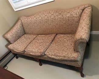 Vintage sofa with carved legs (84”L, 34”D, 34”H)