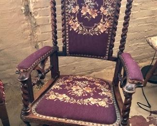 Antique platform rocker with needlepoint seat & back (27”W, 42”H)