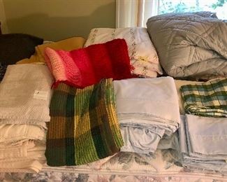 Bed linens: king down comforters, king sheets, vintage Cannon bedspread, blankets, Laura Ashley comforter