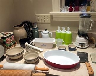 More kitchen: Biscuit jar, crock, Stanley thermos, Corning Ware loaf pan, Emile Henry casseroles, vintage Osterizer blender, Briddel No. 870 cleaver