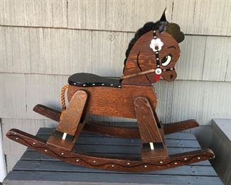 Adorable wooden rocking horse