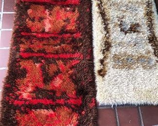 Rya rugs - left one is 24” x 58”, right one is 22” x 48”.