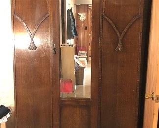 Art Deco armoire - bright spot is lamp reflection (47”L, 16.5”D, 73”H)