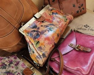 Patricia Nash handbags and each has it's own protective bag.