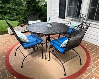 Black 4 rocker chair & round metal dining table set with cushions / excellent condition 