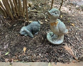 Cement rabbit and duckling lawn ornaments