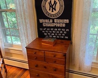 Yankees World Series banner with 7 Antique 7 drawer cabinet