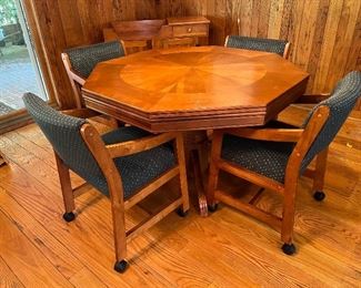 Octagon Victory pedestal game table with reversible table top & 4 upholstered Victory armchairs on casters