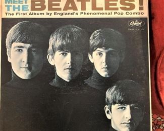 "Meet the Beatles! . . .The First Album by England's Phenomenal Pop Combo"