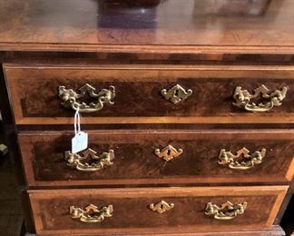 One of two 3-drawer nightstands