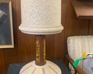 Here is another good one. The sides look like they are enameled. MCM lamp with orginal shade